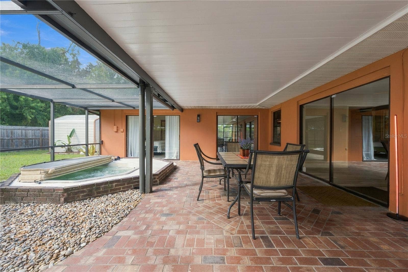 112 PEACOCK CIRCLE, Safety Harbor, FL 34695 69. Brick Pavers are Perfect for This Extremely Large Lanai.. An Extension of Your Living Space!