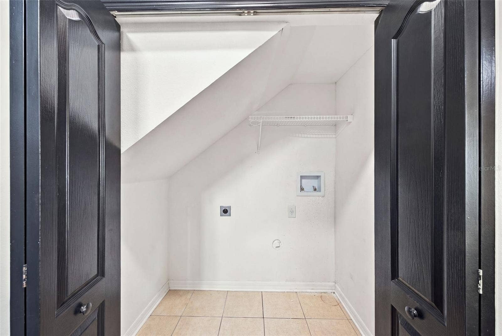 30316 ELDERWOOD DRIVE, Wesley Chapel, FL 33543 Laundry closet-downstairs