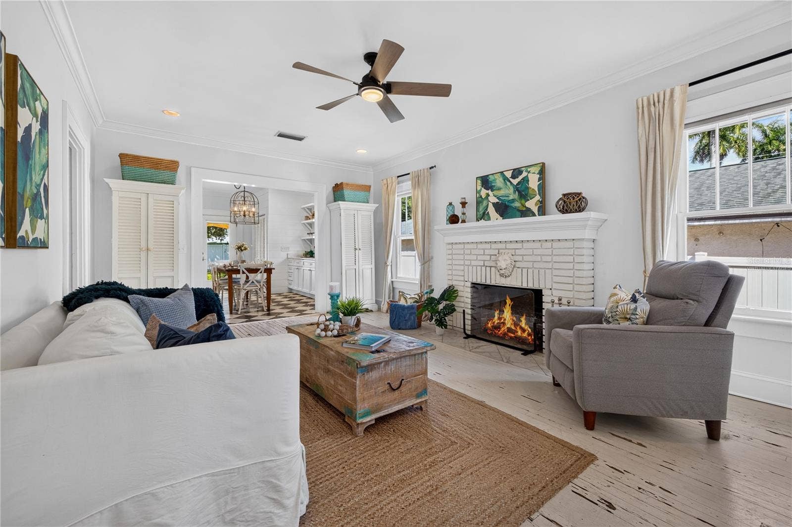 2106 8TH AVENUE W, Bradenton, FL 34205 Living room (Fire in fireplace is virtually staged)