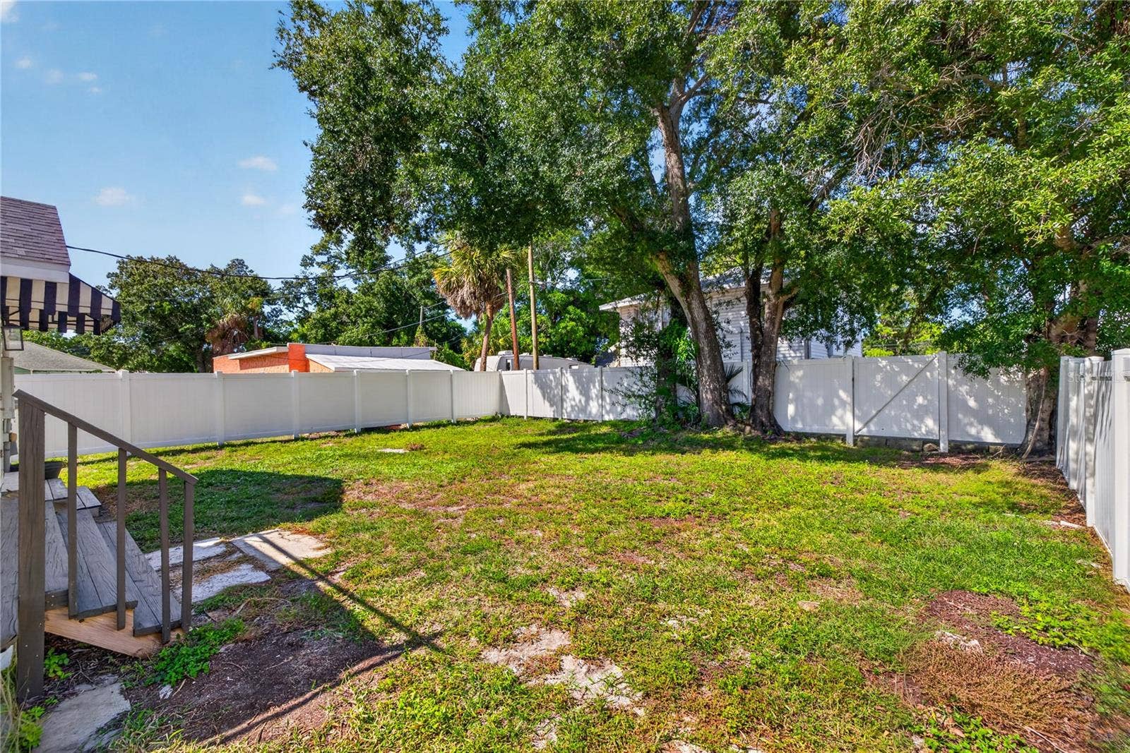 2106 8TH AVENUE W, Bradenton, FL 34205 Newly fenced in backyard