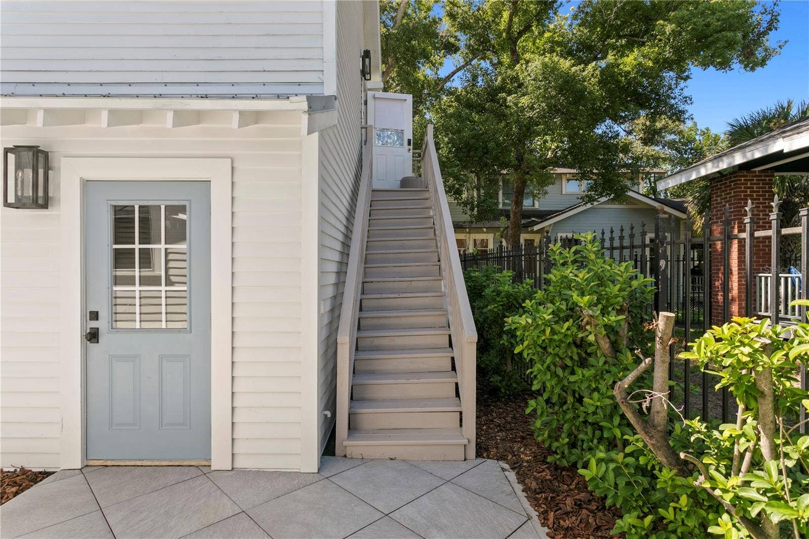 913 S BRUCE STREET, Tampa, FL 33606 Door to the 2 car garage, Stairs lead to the Guest House