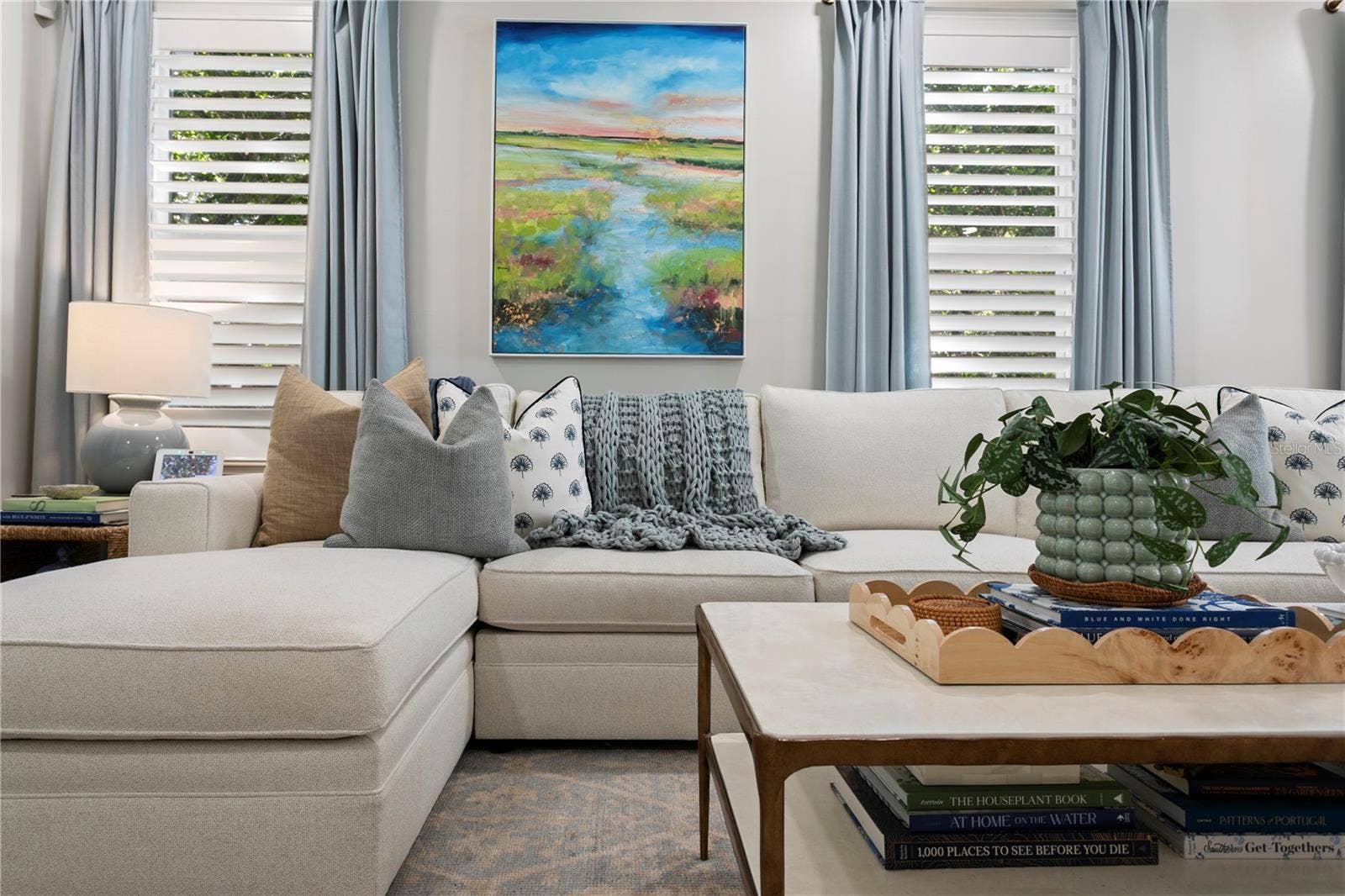 913 S BRUCE STREET, Tampa, FL 33606 Layered window treatments with shutters and drapery