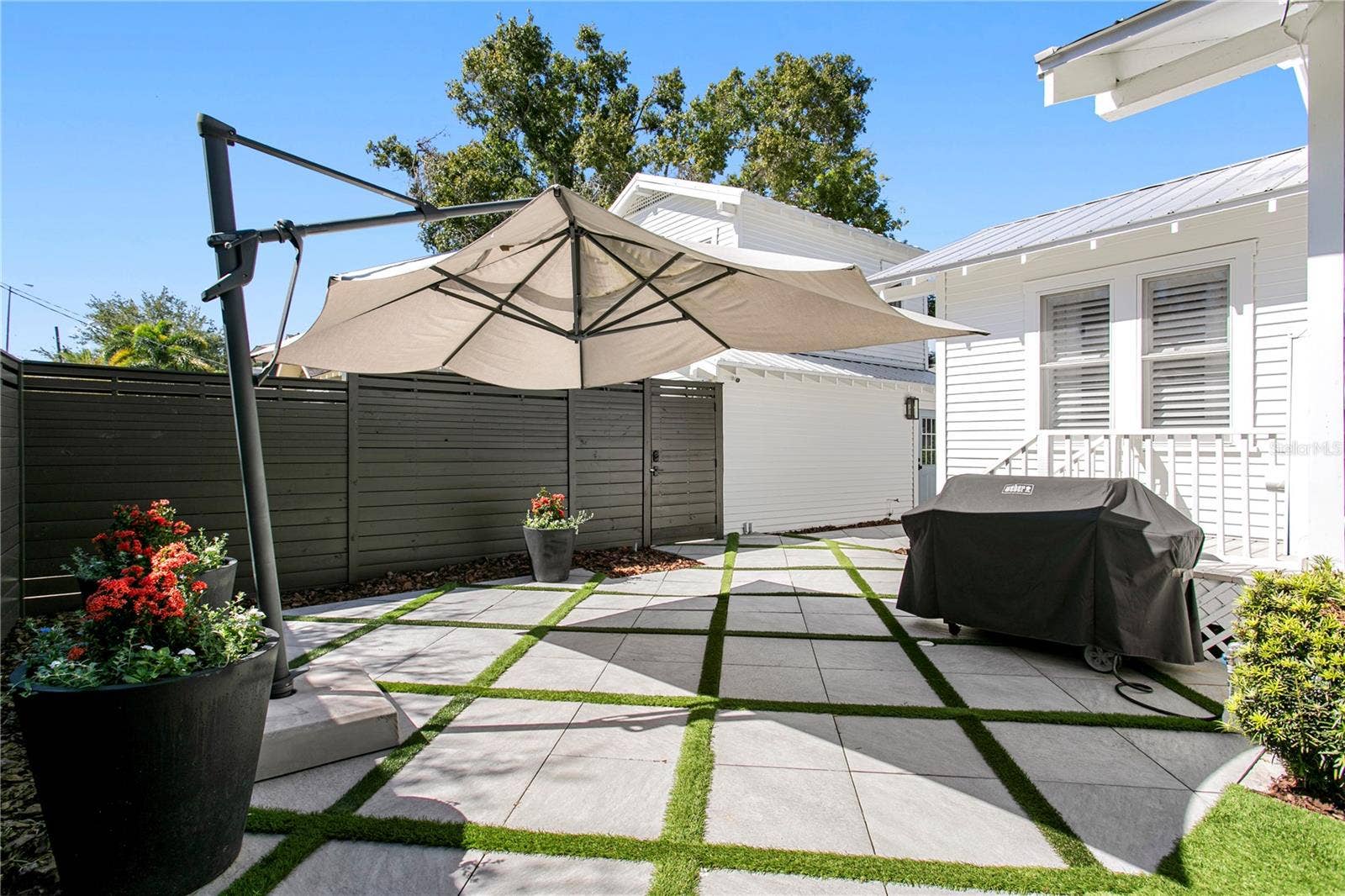 913 S BRUCE STREET, Tampa, FL 33606 Landscaped without the stress of real grass