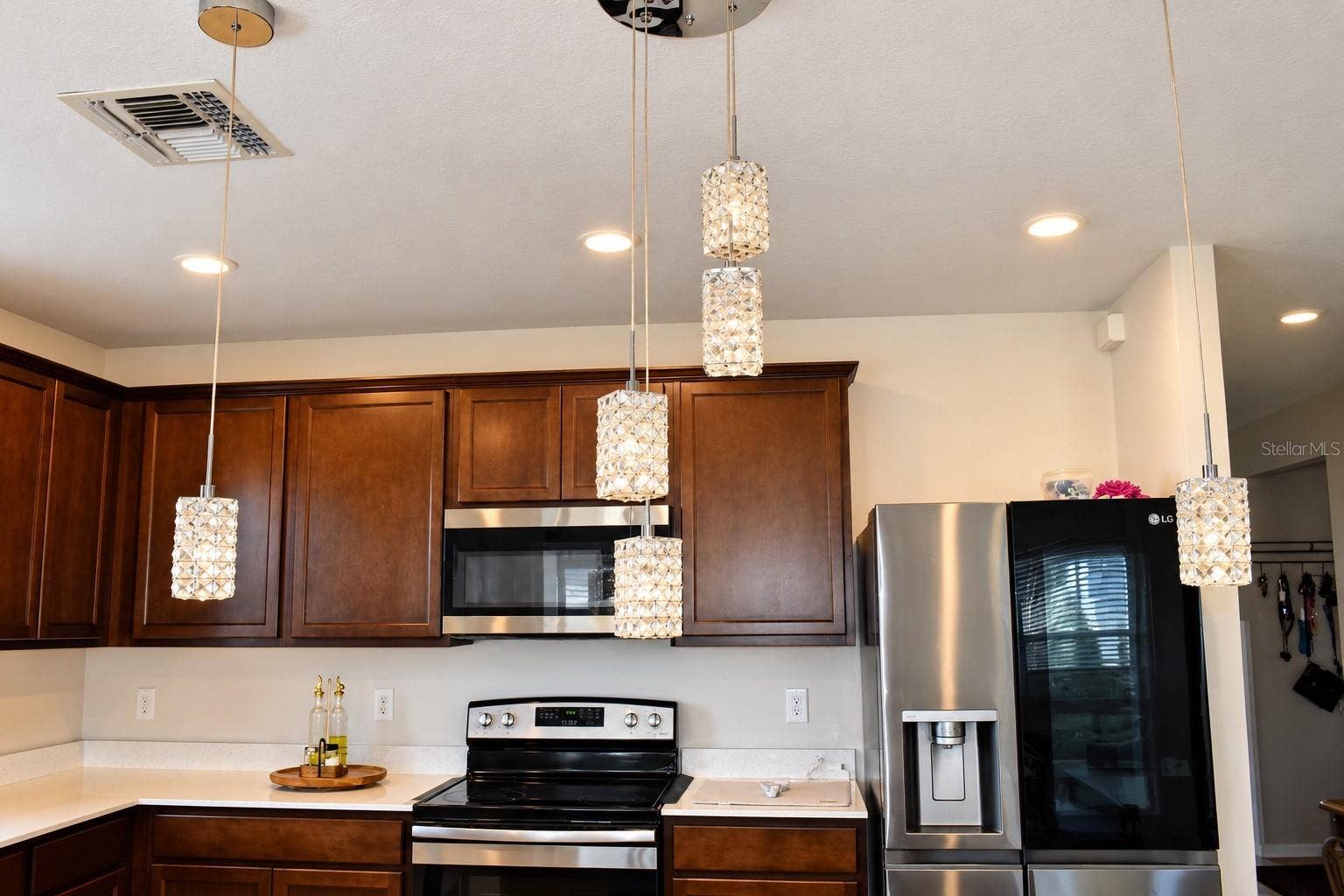 Beautiful Kitchen with Elegant Pendant Lighting