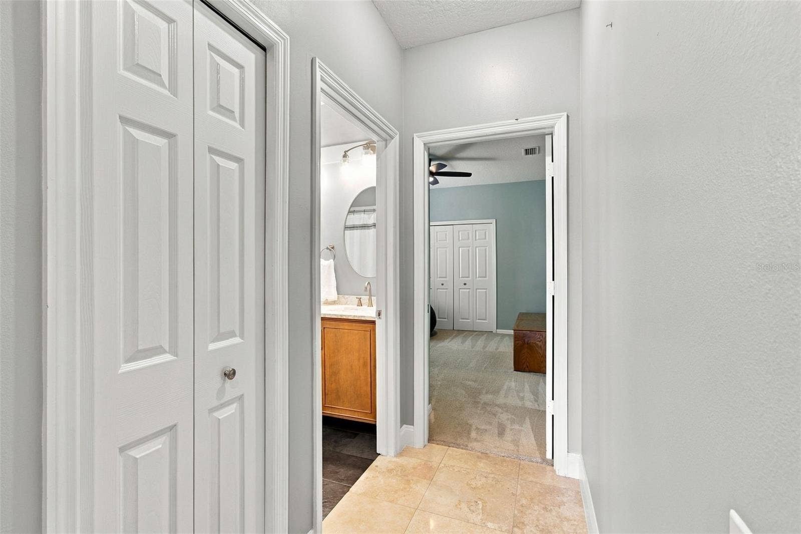 5406 E LONGBOAT, Tampa, FL 33615 hallway to guest bath and bedroom 4