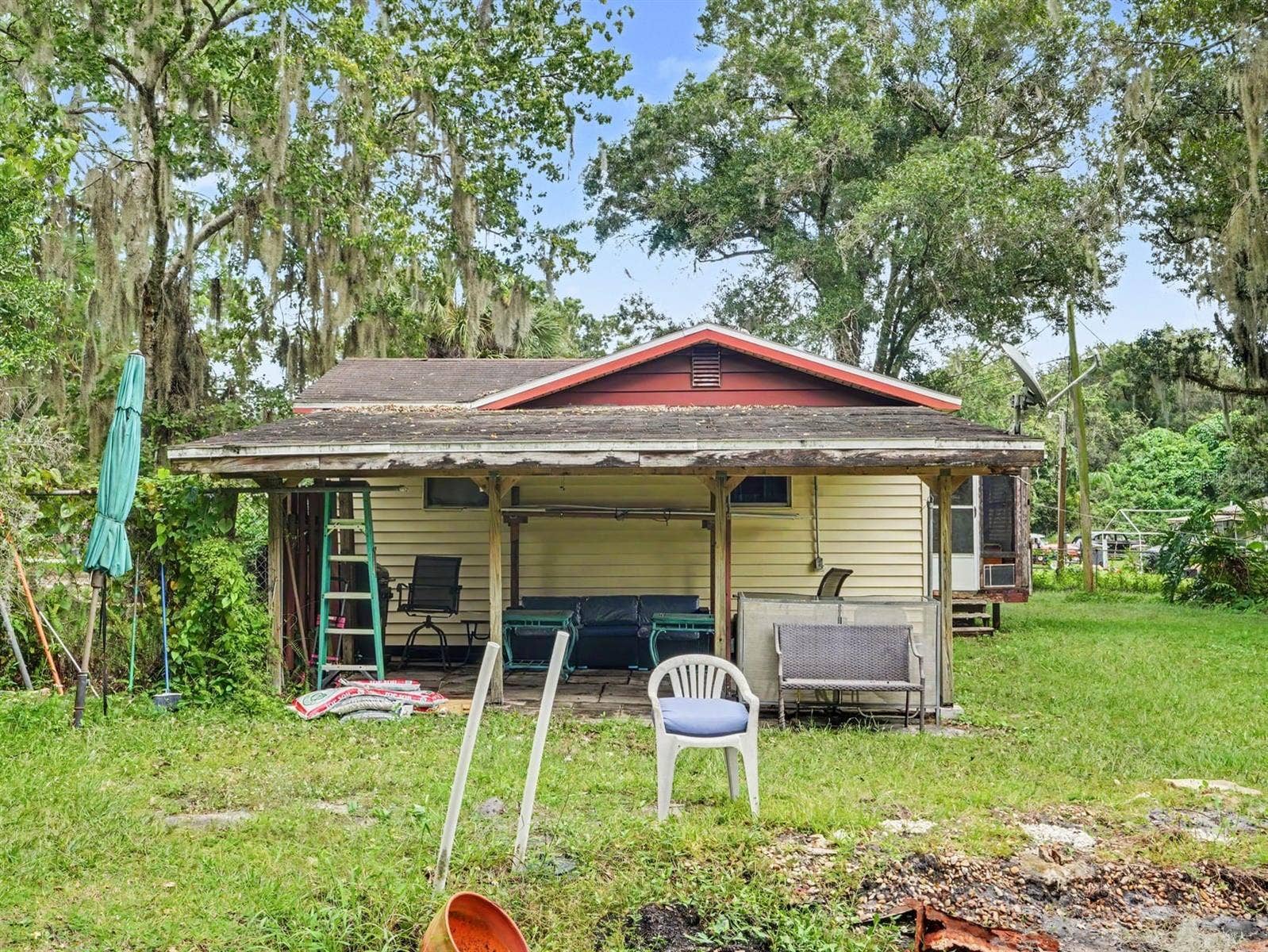 3015 STRAWBERRY LANE, Lakeland, FL 33801 Home Set Among Mature Oak Trees with Front Covered Carport