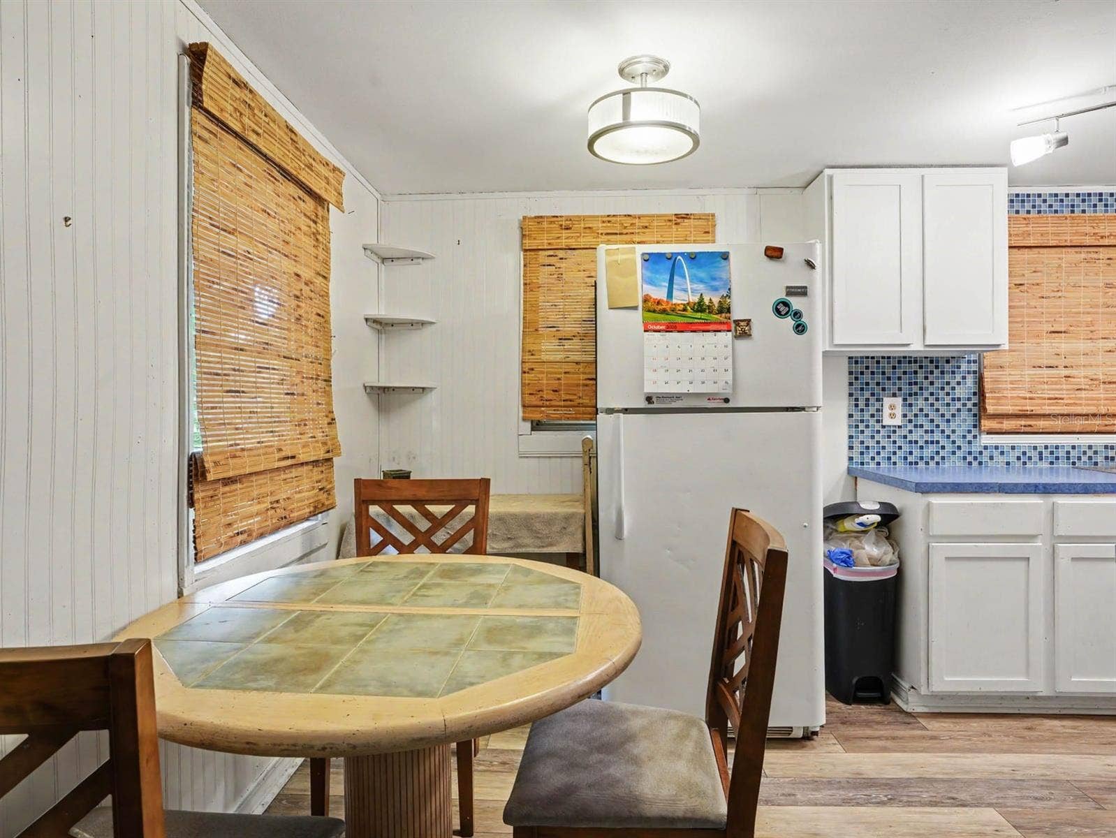 3015 STRAWBERRY LANE, Lakeland, FL 33801 Kitchen Features Blue Tile Backsplash & Updated Appliances