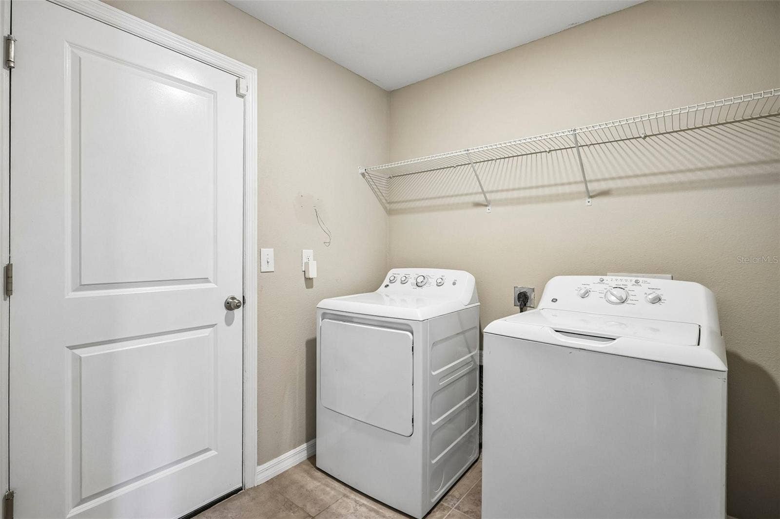 4103 GLOBE THISTLE DRIVE, Tampa, FL 33619 laundry room