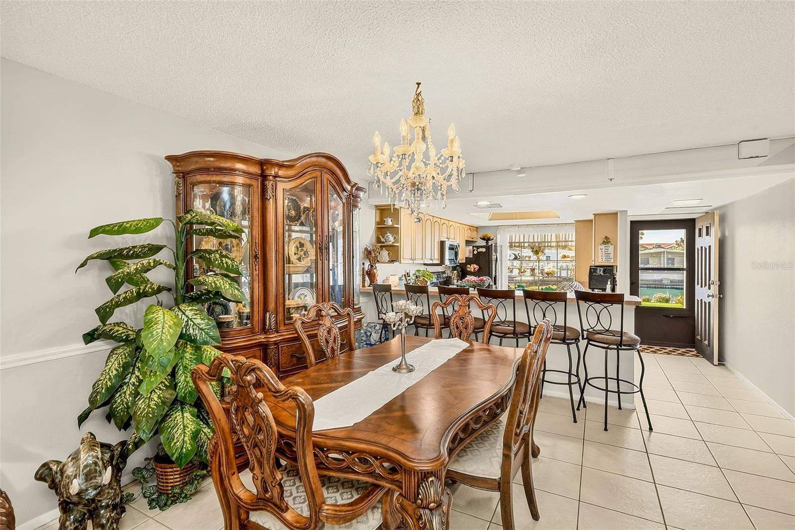 19029 US HIGHWAY 19 N, #21F, Clearwater, FL 33764 View of dining room and kitchen