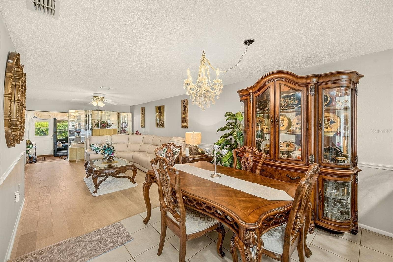 19029 US HIGHWAY 19 N, #21F, Clearwater, FL 33764 View of dining room and living room and bonus room