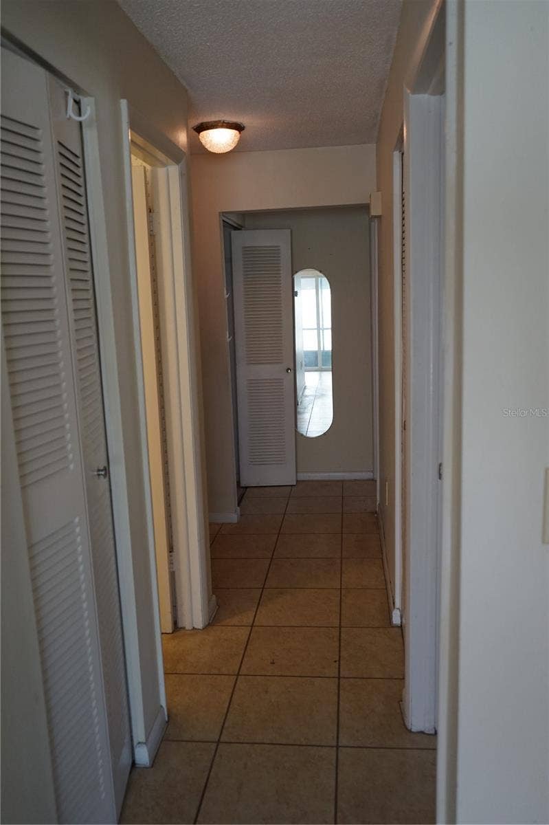 hallway to bedrooms and bath