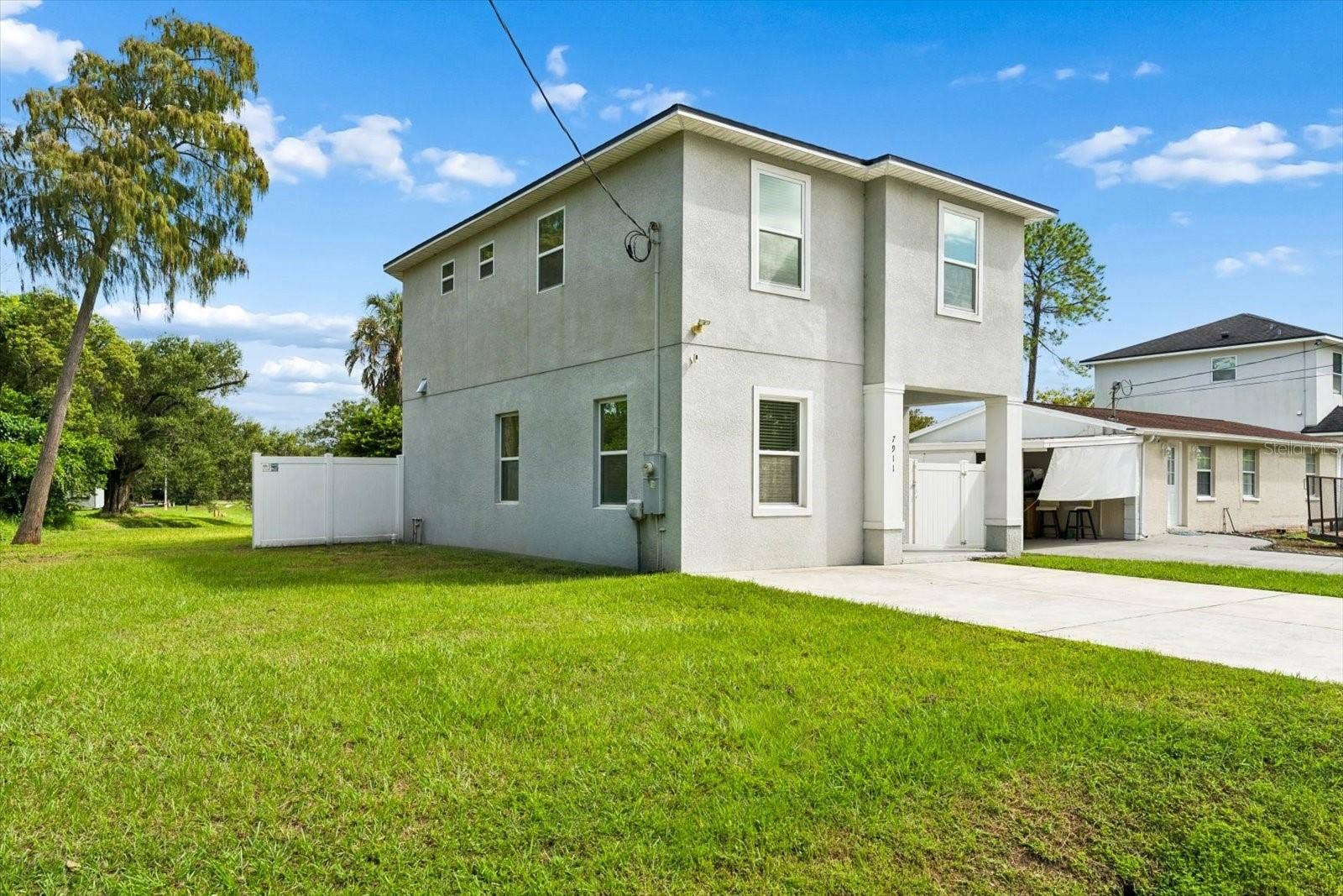 7911 N PACKWOOD AVENUE, Tampa, FL 33604 7911 N PACKWOOD AVENUE, Tampa, FL 33604