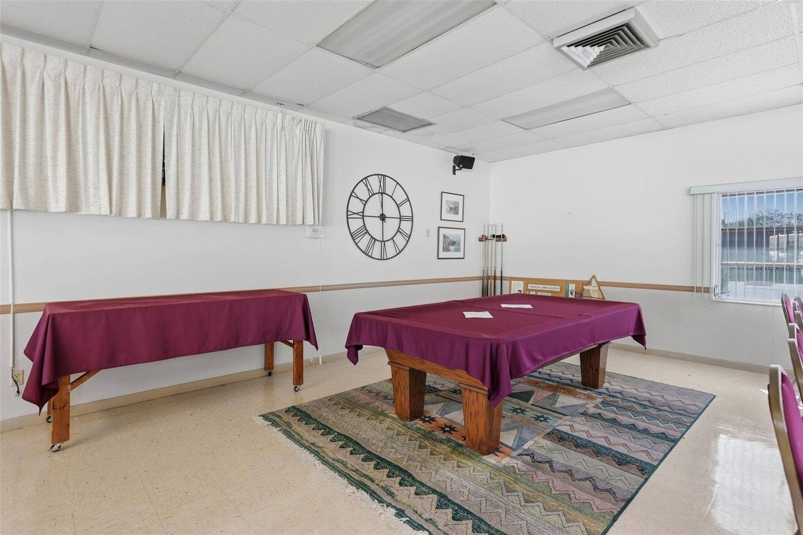 7035 MONTE CARLO N, Pinellas Park, FL 33781 Community clubhouse recreation room with billiards table.