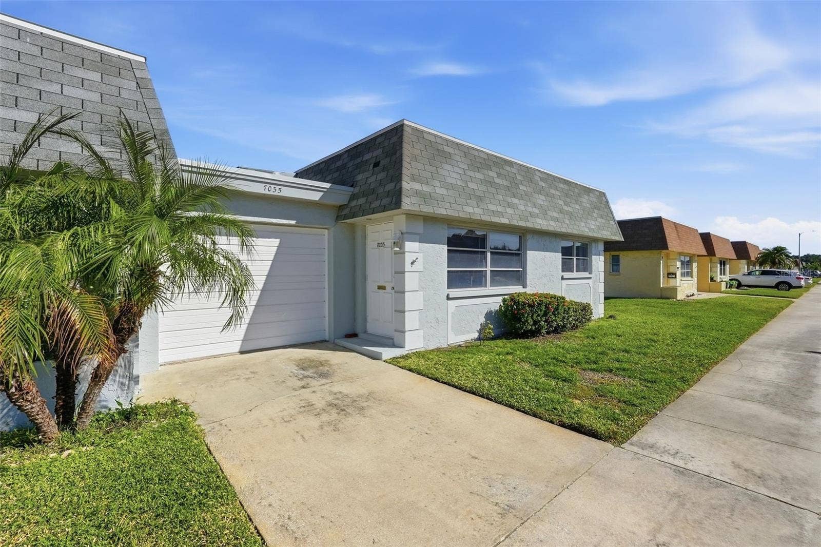 7035 MONTE CARLO N, Pinellas Park, FL 33781 Front exterior view of 7035 Monte Carlo N in the 55+ Vendome Village community