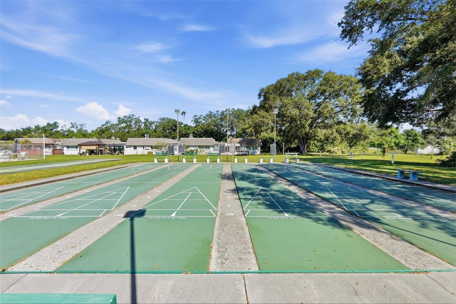 7035 MONTE CARLO N, Pinellas Park, FL 33781 Community shuffleboard courts provide additional recreational opportunities.