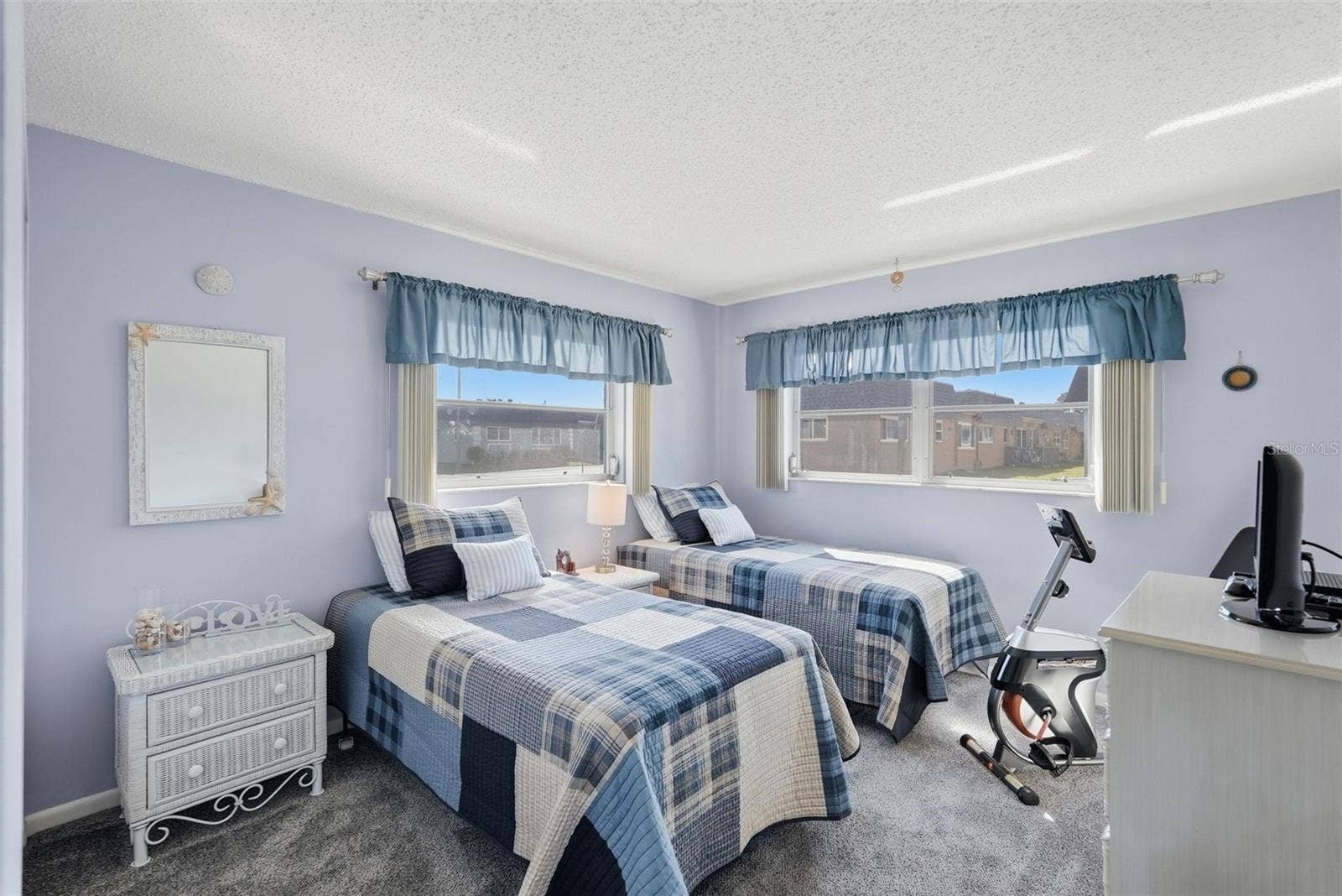 7035 MONTE CARLO N, Pinellas Park, FL 33781 Bedroom 2, featuring twin beds, natural light.