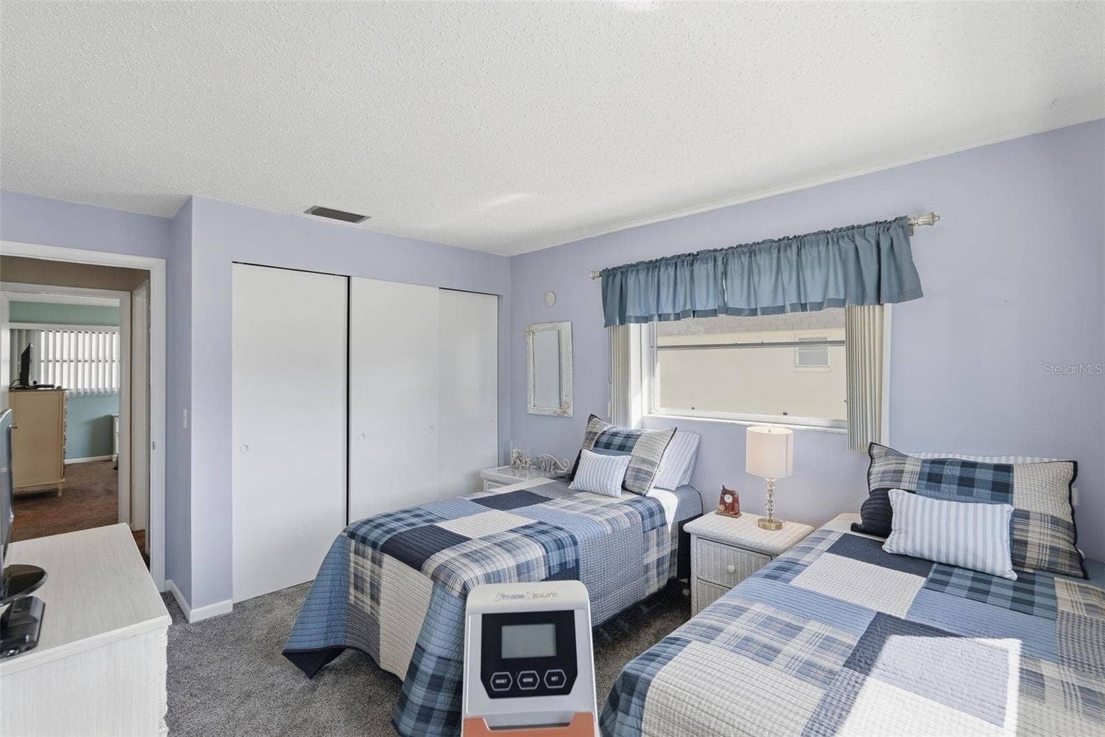 7035 MONTE CARLO N, Pinellas Park, FL 33781 Additional view of Bedroom 2 with closet space and two windows.