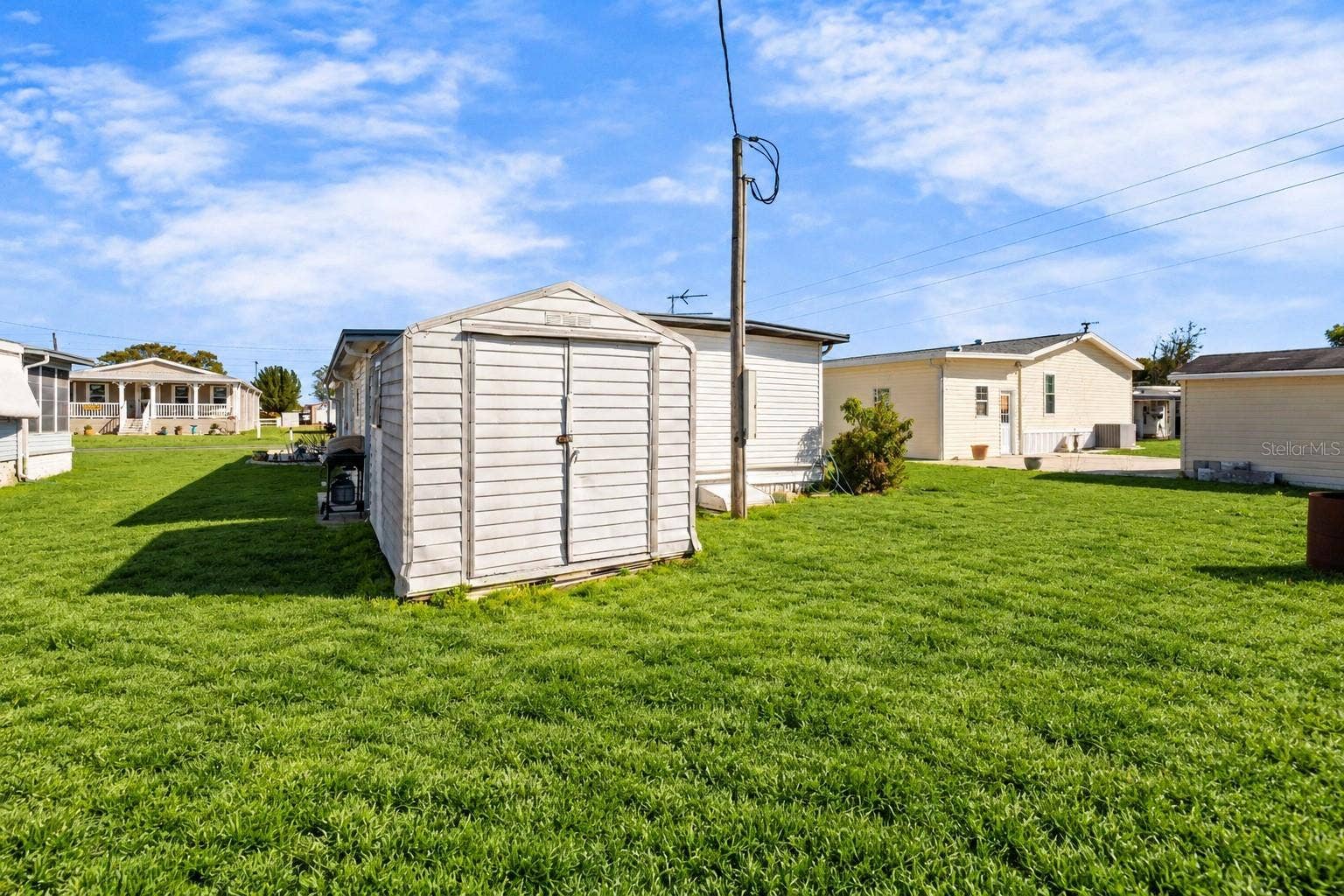 37332 SANDRA AVENUE, Zephyrhills, FL 33542 Detached storage shed.