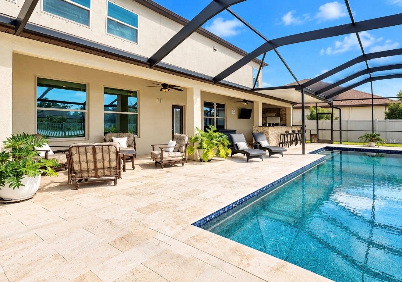 10411 CARDERA DRIVE, Riverview, FL 33578 TRAVERTINE ENTERTAINING SPACE