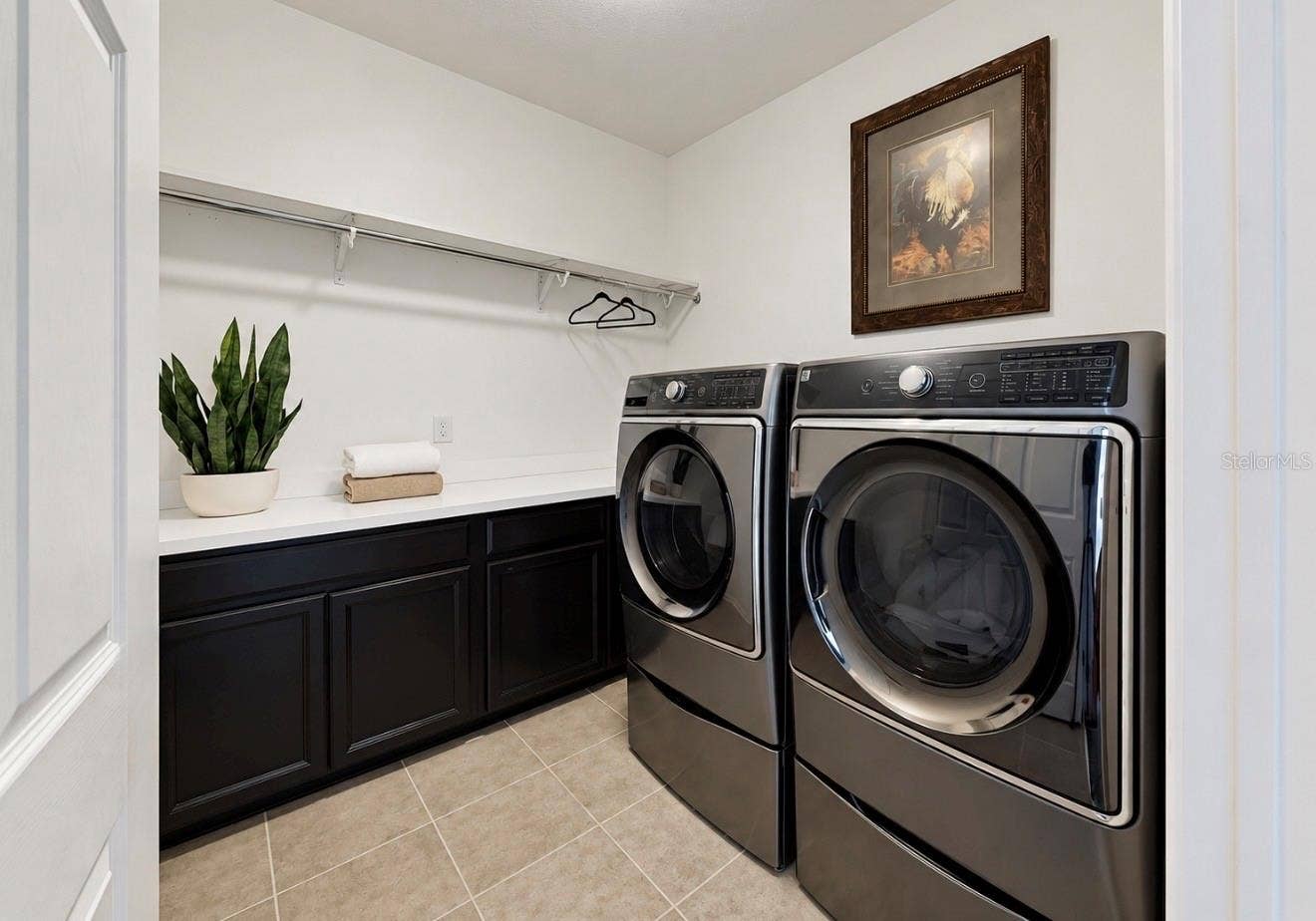 10411 CARDERA DRIVE, Riverview, FL 33578 UPSTAIRS LAUNDRY ROOM-WITH BUILT IN STORAGE