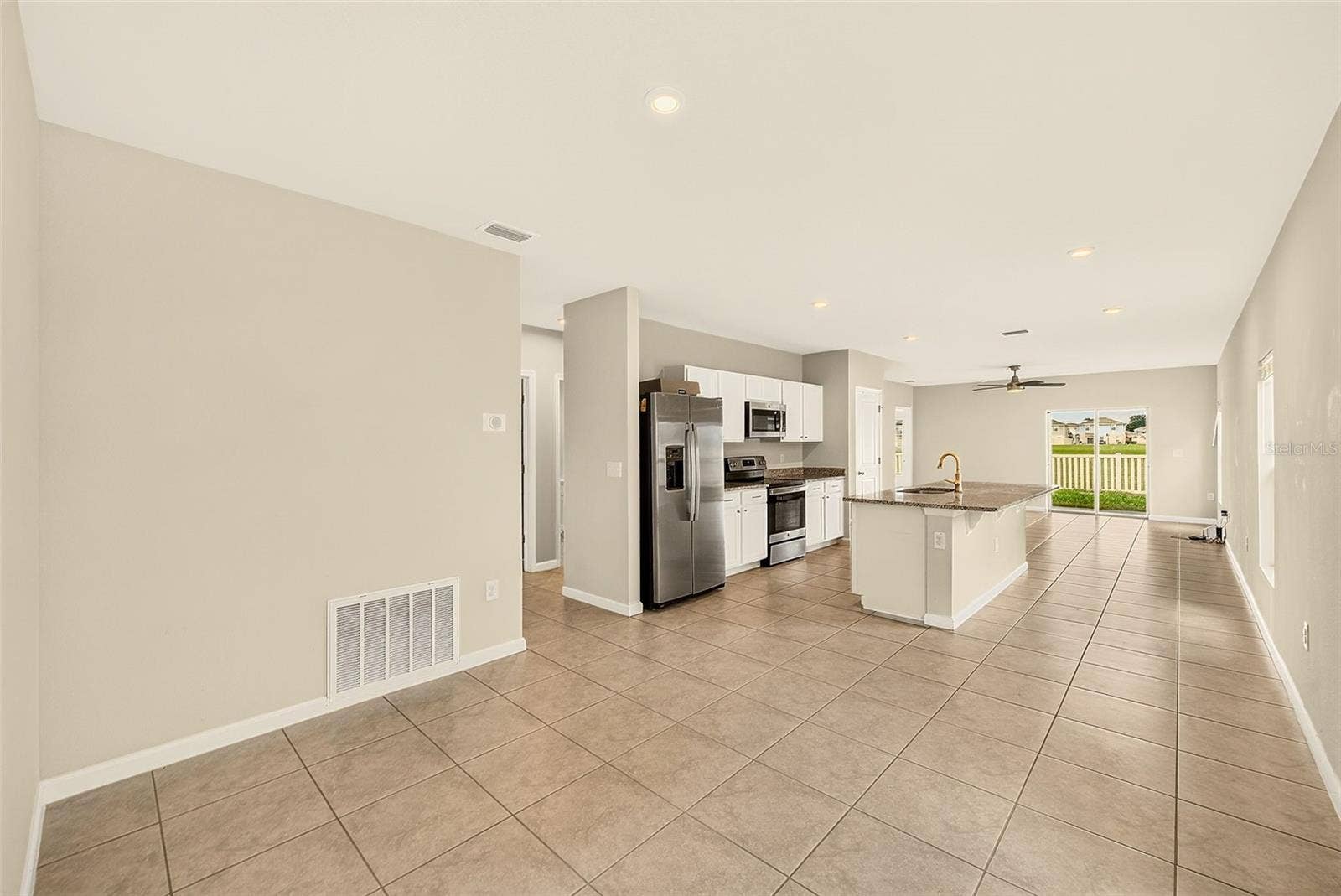 DINING TO KITCHEN TO GREAT ROOM