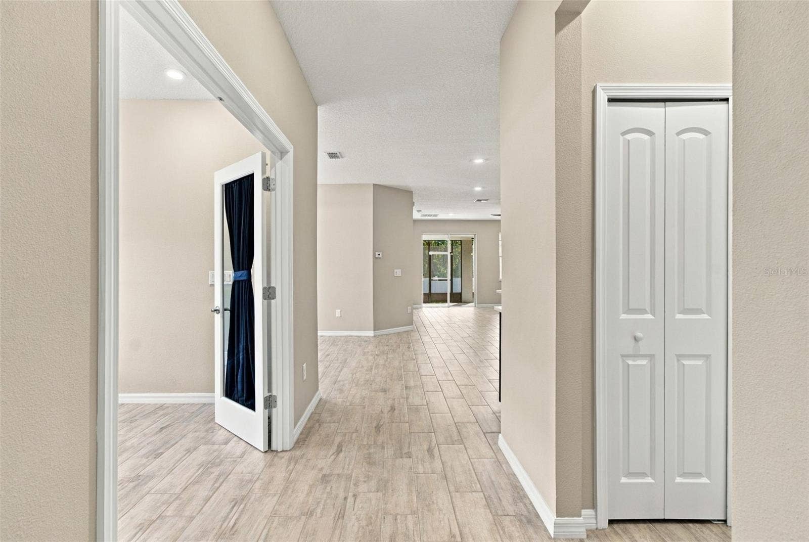 12417 BRICK COBBLESTONE DRIVE, Riverview, FL 33579 Coat closet to the right, office to the left, facing living and dining rooms