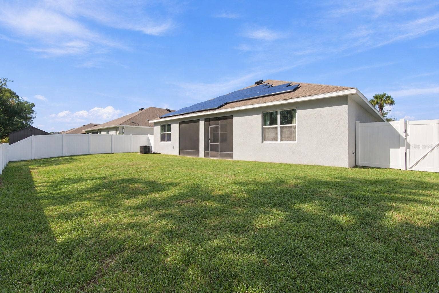 12417 BRICK COBBLESTONE DRIVE, Riverview, FL 33579 Backyard facing house