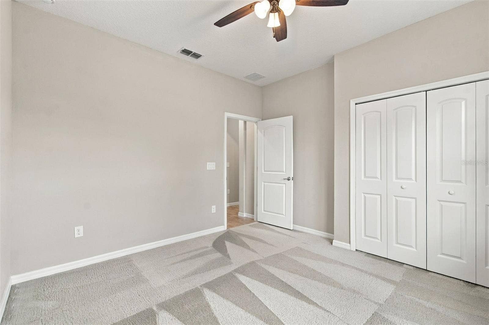 12417 BRICK COBBLESTONE DRIVE, Riverview, FL 33579 Guest bedroom with ceiling fan