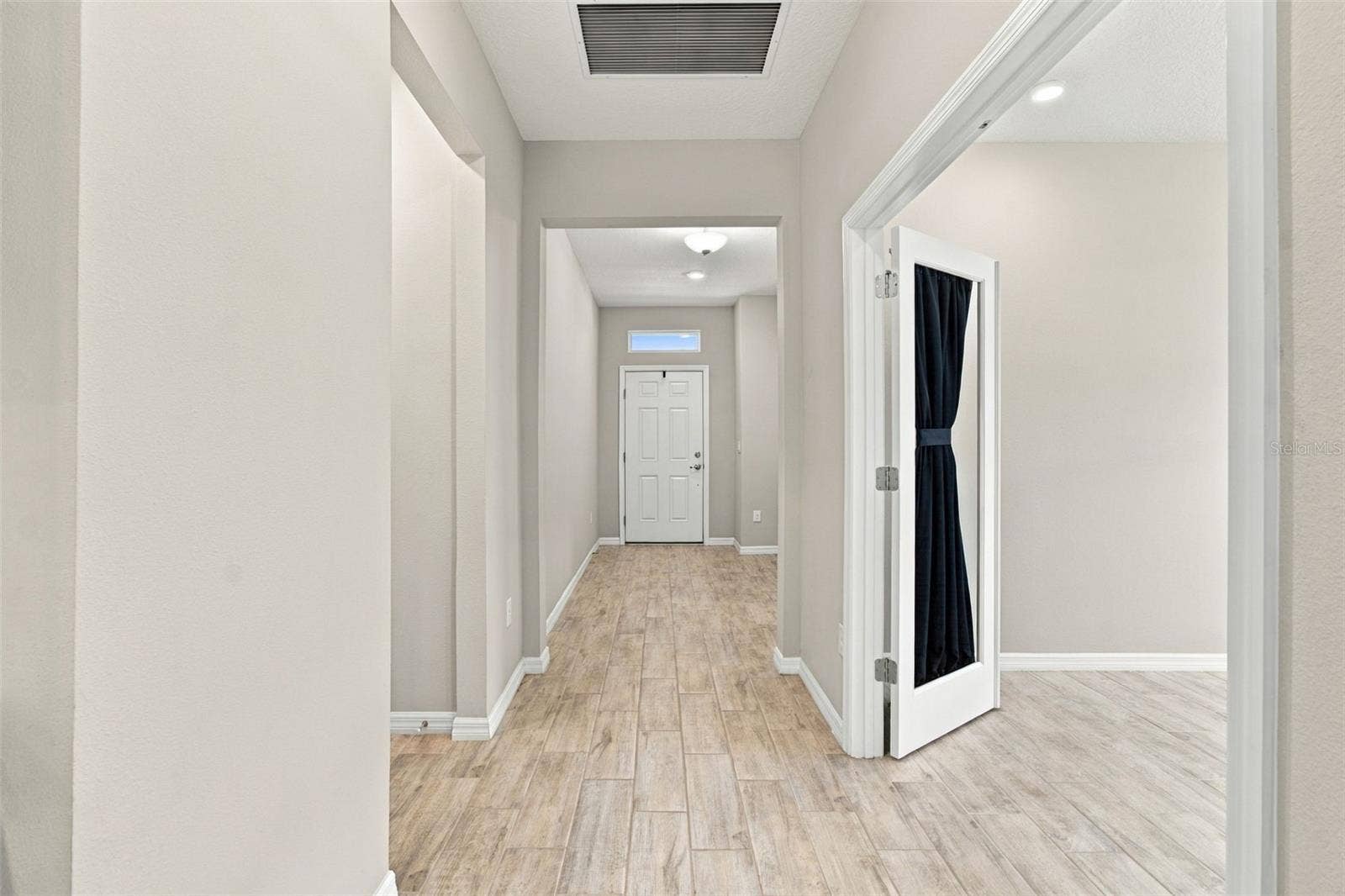 12417 BRICK COBBLESTONE DRIVE, Riverview, FL 33579 Foyer - front door in the background, office entry to the right