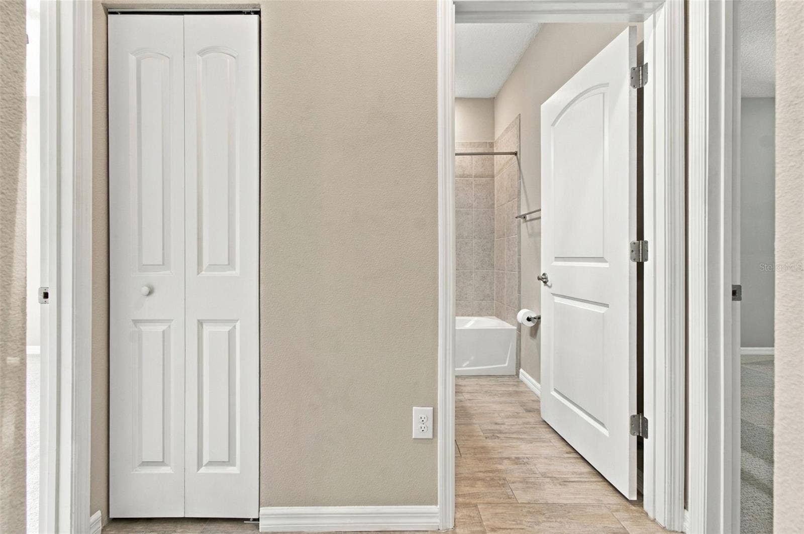 12417 BRICK COBBLESTONE DRIVE, Riverview, FL 33579 Linen Closet to the left, Full Bathroom to the right