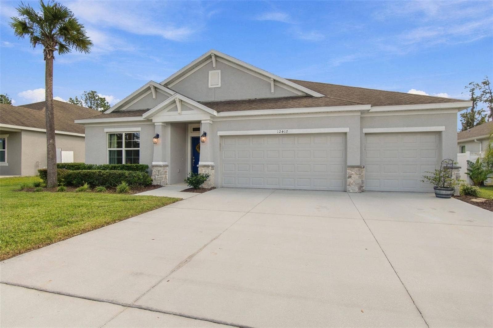 12417 BRICK COBBLESTONE DRIVE, Riverview, FL 33579 Front exterior - driveway and 3 car garage