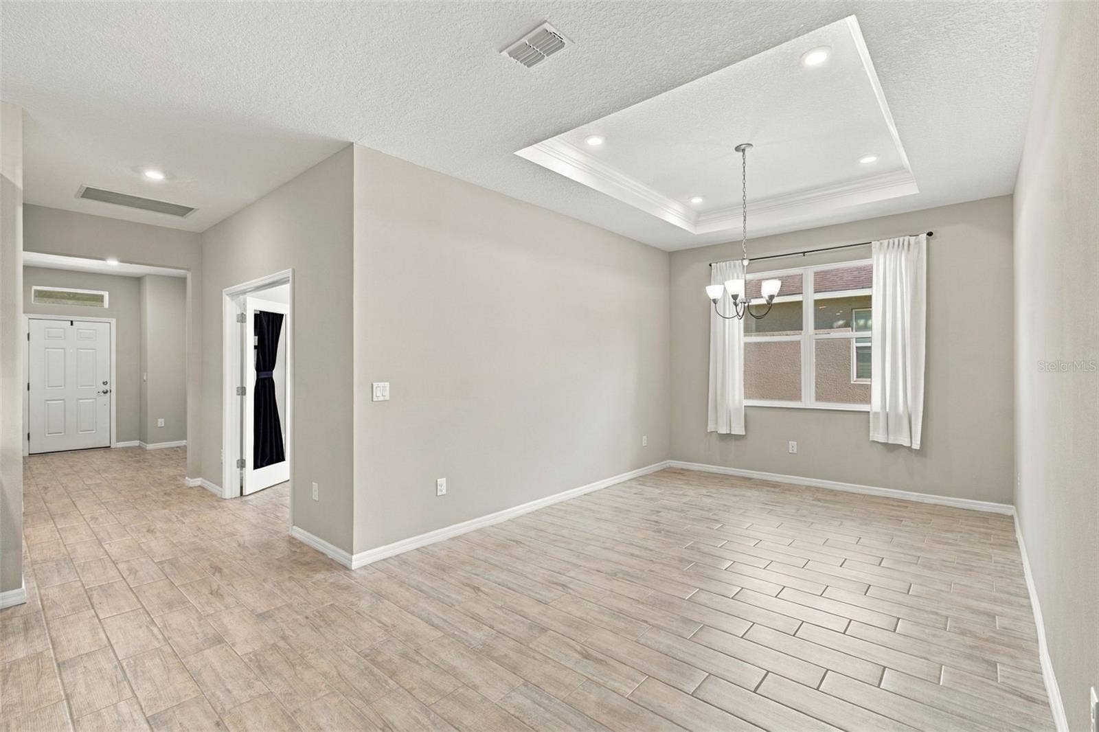 12417 BRICK COBBLESTONE DRIVE, Riverview, FL 33579 Dining Room with tray ceiling