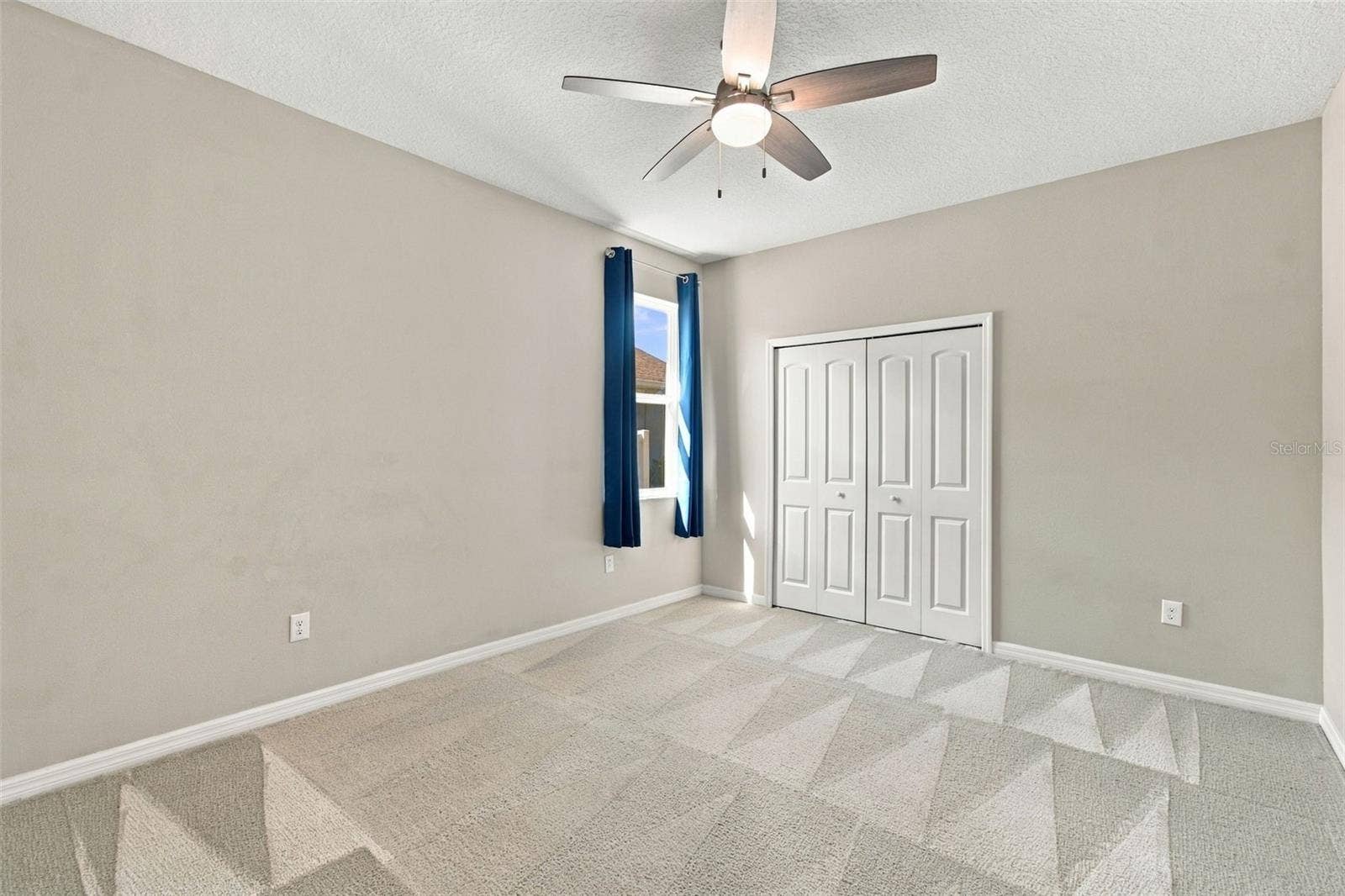 12417 BRICK COBBLESTONE DRIVE, Riverview, FL 33579 Larger bedroom with ceiling fan
