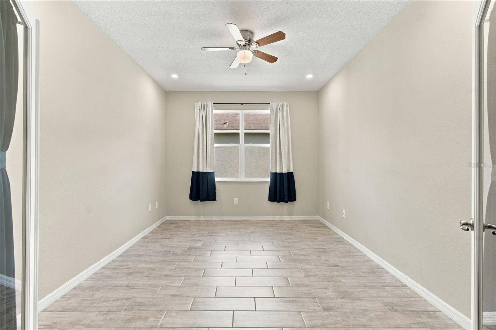12417 BRICK COBBLESTONE DRIVE, Riverview, FL 33579 French doors open to private office with ceiling fan