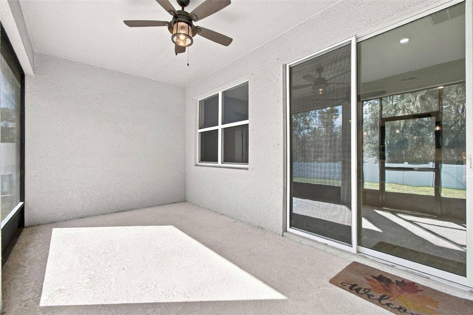 12417 BRICK COBBLESTONE DRIVE, Riverview, FL 33579 Screened-in Patio with ceiling fan