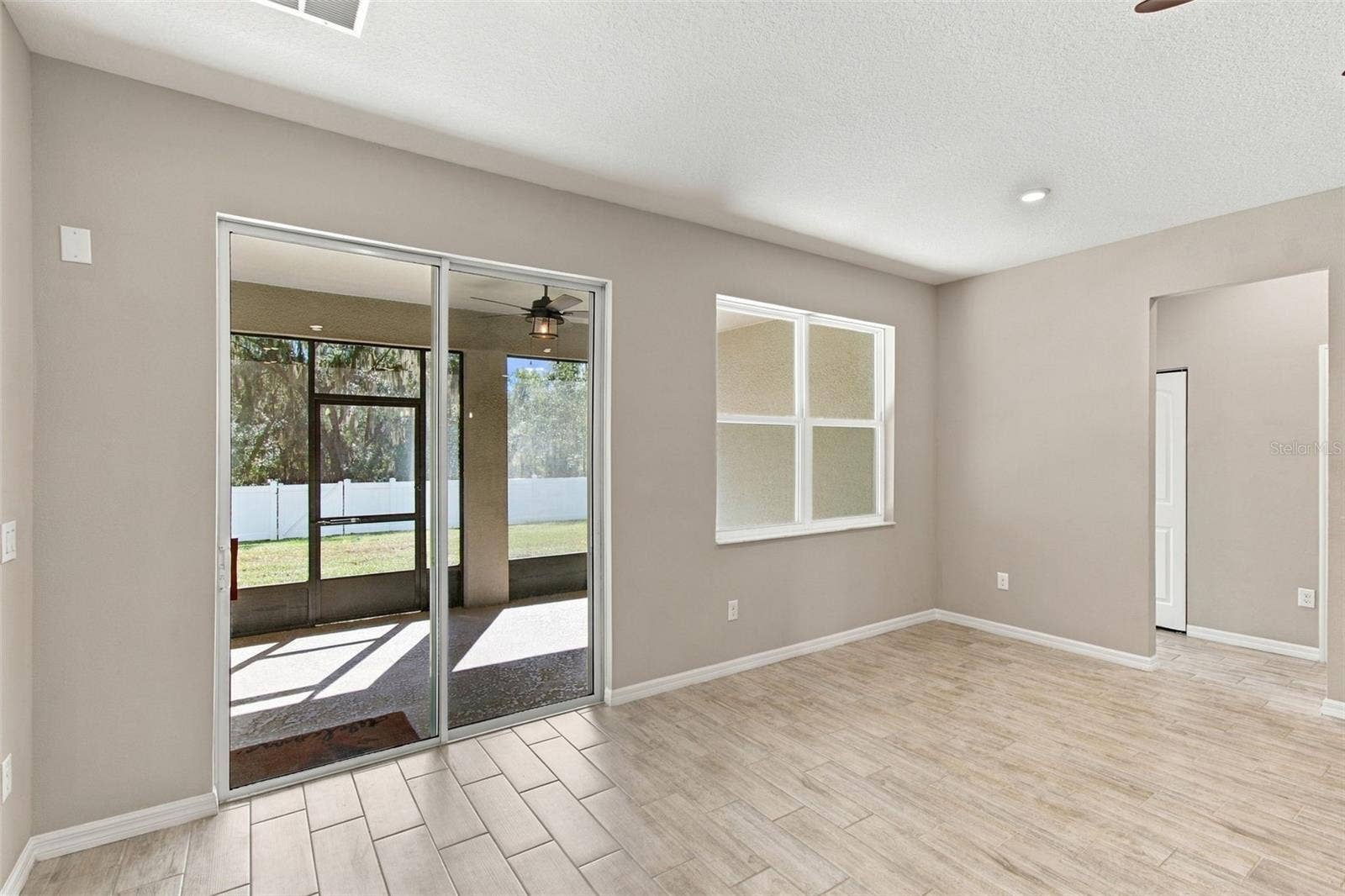 12417 BRICK COBBLESTONE DRIVE, Riverview, FL 33579 Sliding Glass doors leading to Patio