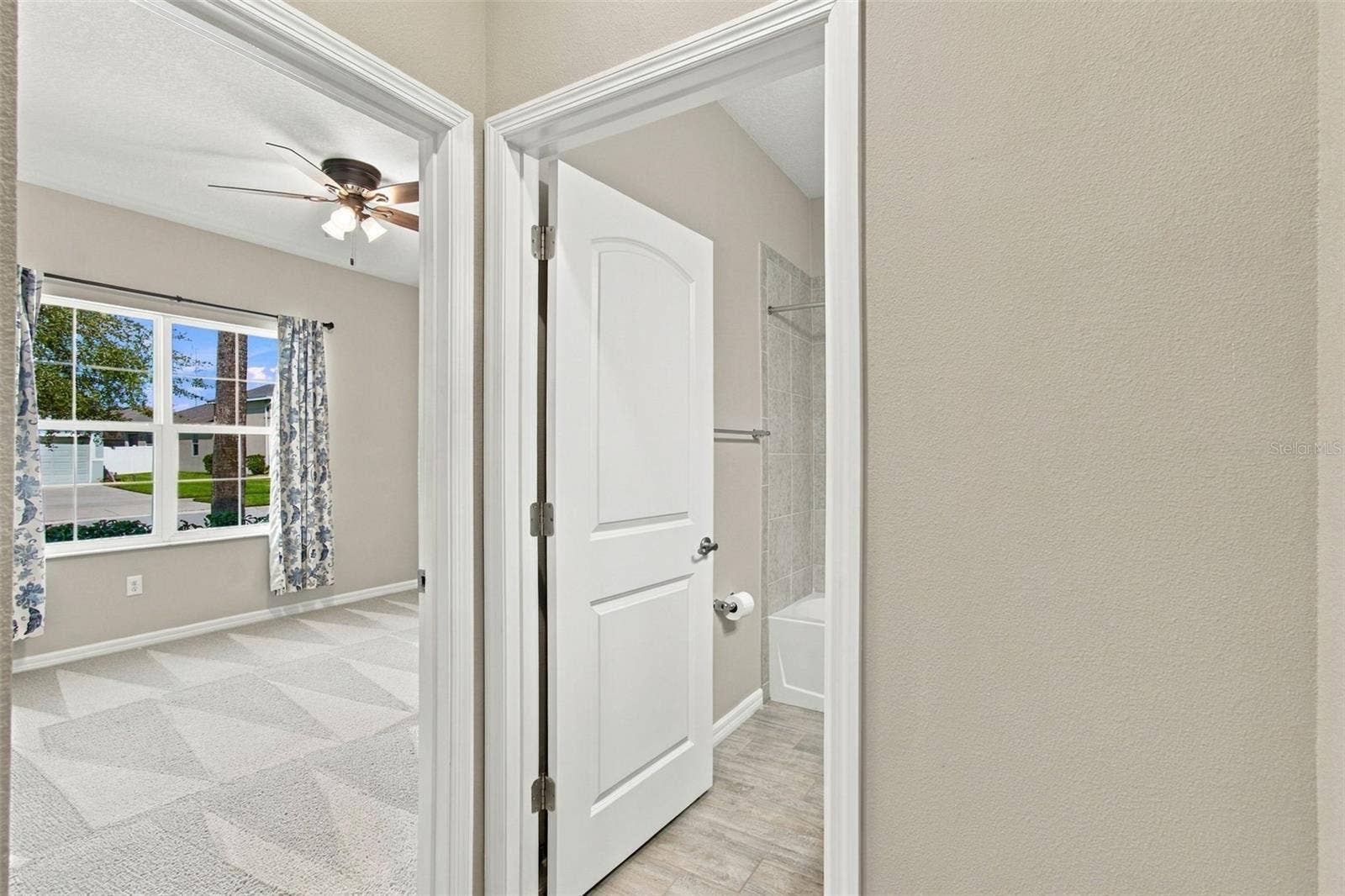12417 BRICK COBBLESTONE DRIVE, Riverview, FL 33579 Guest bedroom to the left and full bathroom to the right