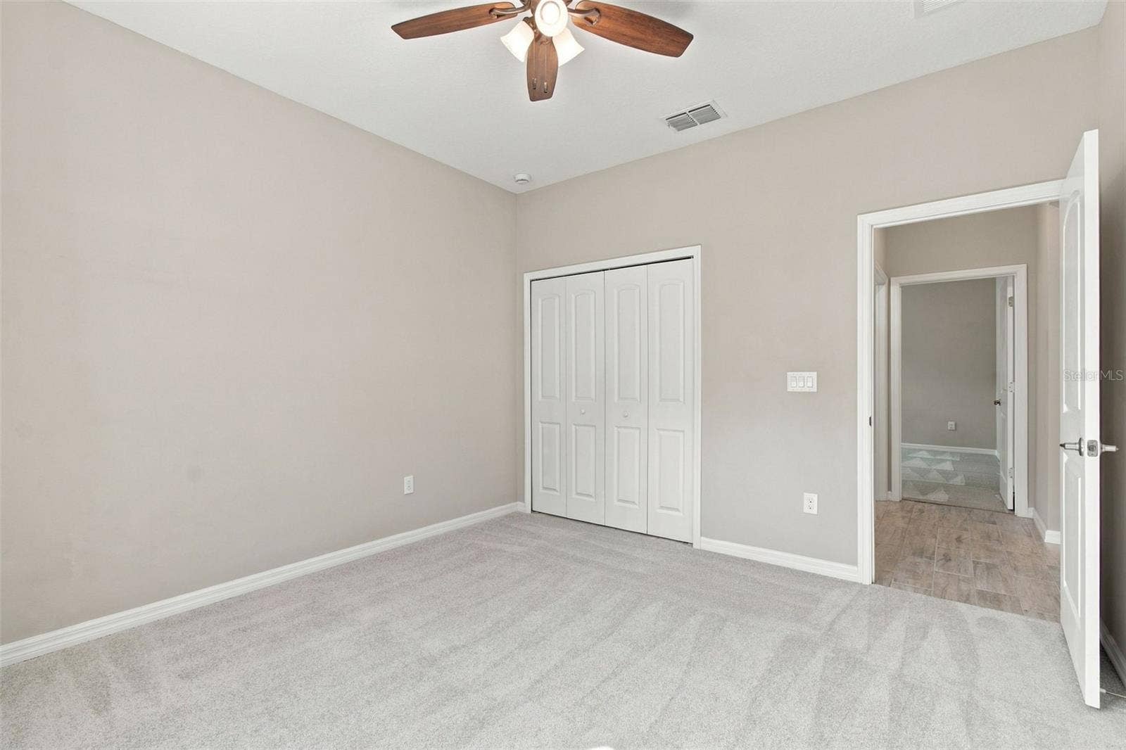 12417 BRICK COBBLESTONE DRIVE, Riverview, FL 33579 Bedroom with ceiling fan