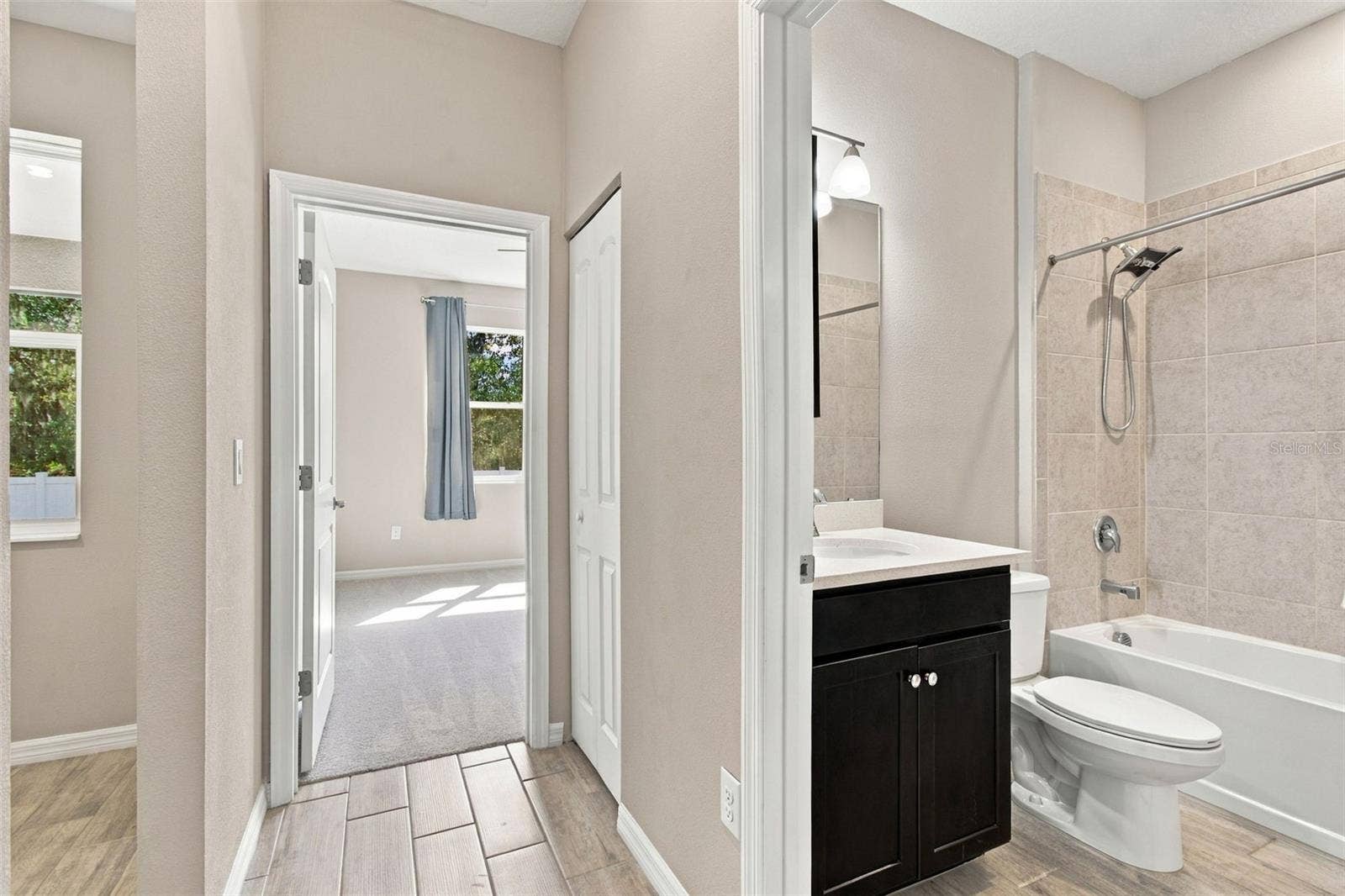12417 BRICK COBBLESTONE DRIVE, Riverview, FL 33579 Bedroom to the left, shared bathroom to the right