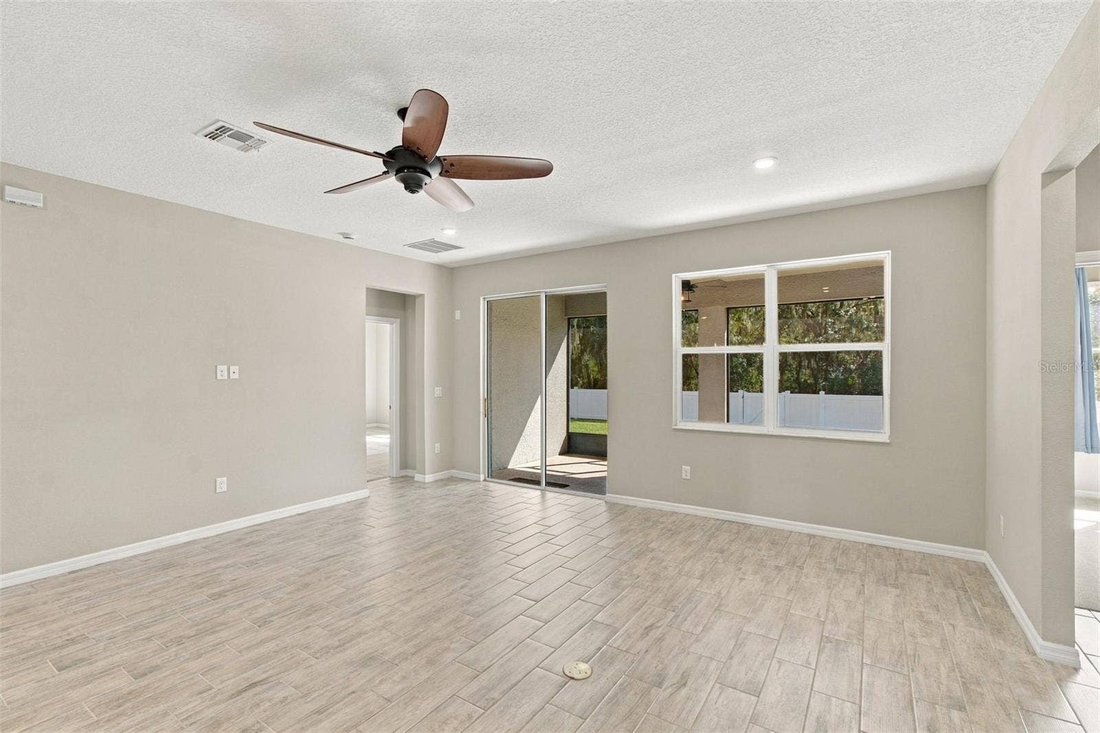 12417 BRICK COBBLESTONE DRIVE, Riverview, FL 33579 Living Room with ceiling fan