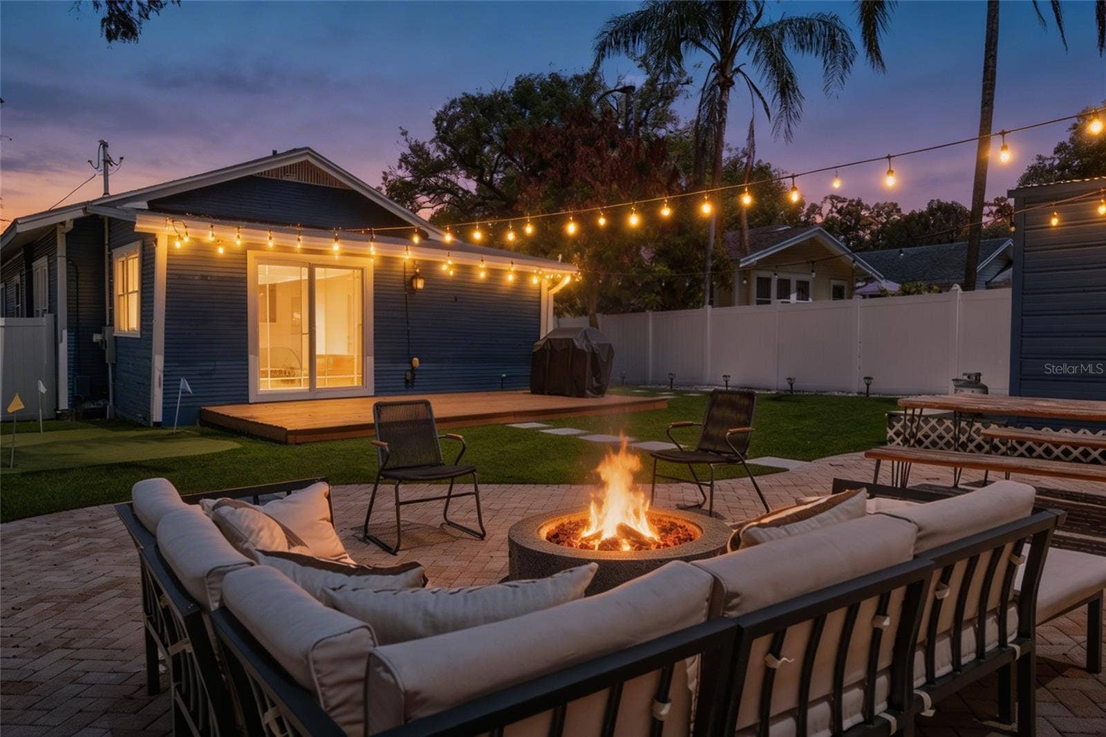 324 W HAYA STREET, Tampa, FL 33603 Backyard with fire pit & turf