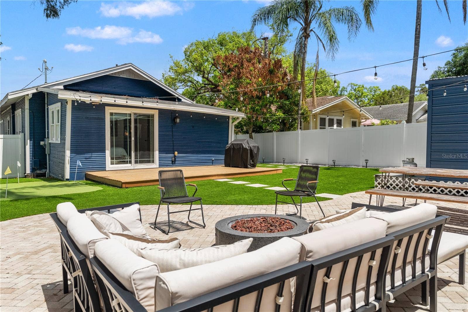 324 W HAYA STREET, Tampa, FL 33603 Backyard with fire pit & turf