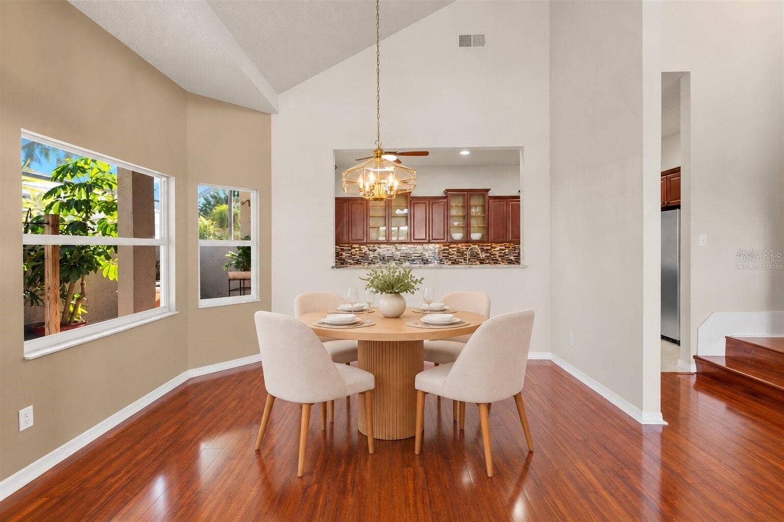 759 MASTERPIECE DRIVE, Sun City Center, FL 33573 Virtually Staged - Dining Room and Kitchen