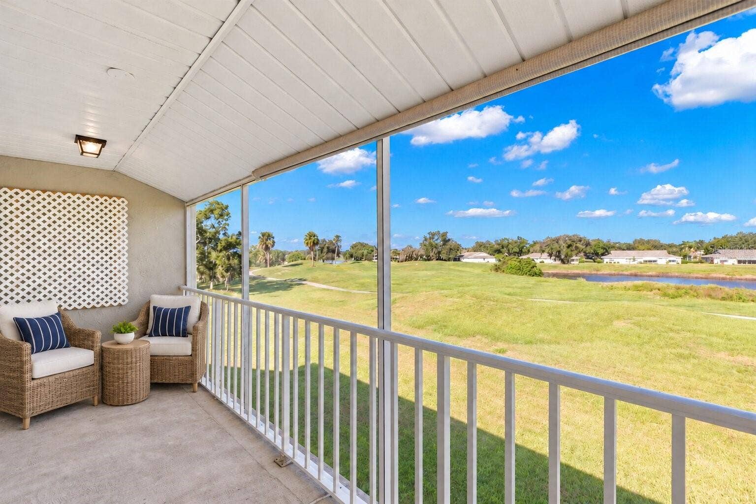 759 MASTERPIECE DRIVE, Sun City Center, FL 33573 Virtually Staged - Second Floor Balcony
