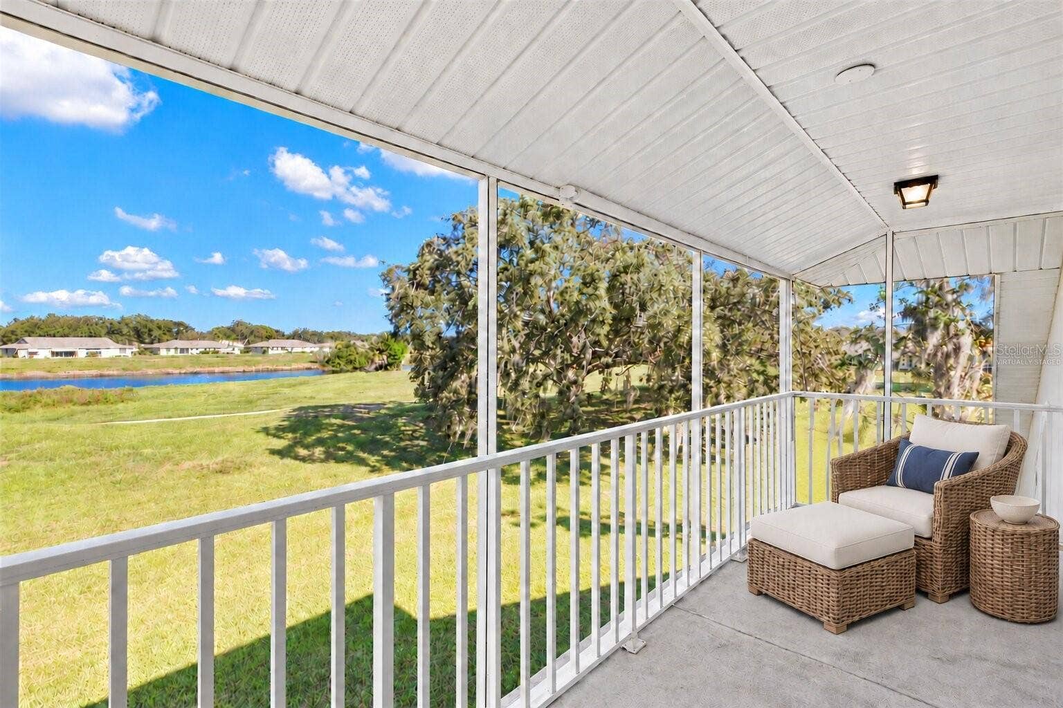 759 MASTERPIECE DRIVE, Sun City Center, FL 33573 Virtually Staged - Second Floor Balcony