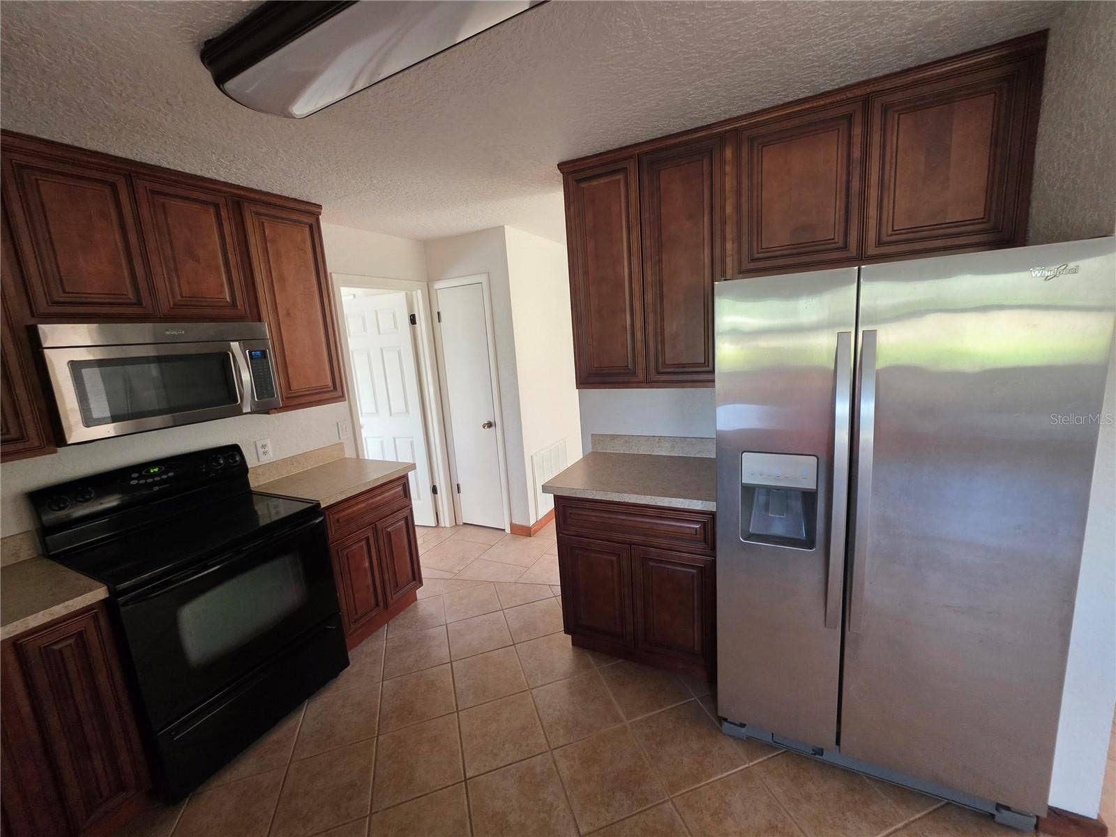 8270 NORMLEE ROAD, Weeki Wachee, FL 34613 Cherry wood Cabinets