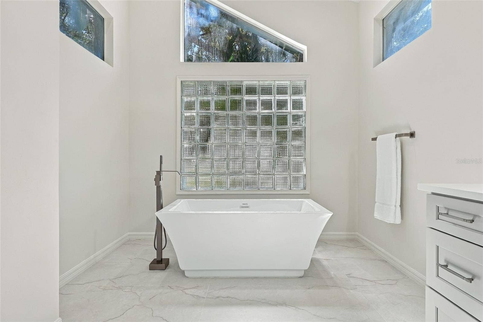 Gorgeous soaking tub in the primary bath.