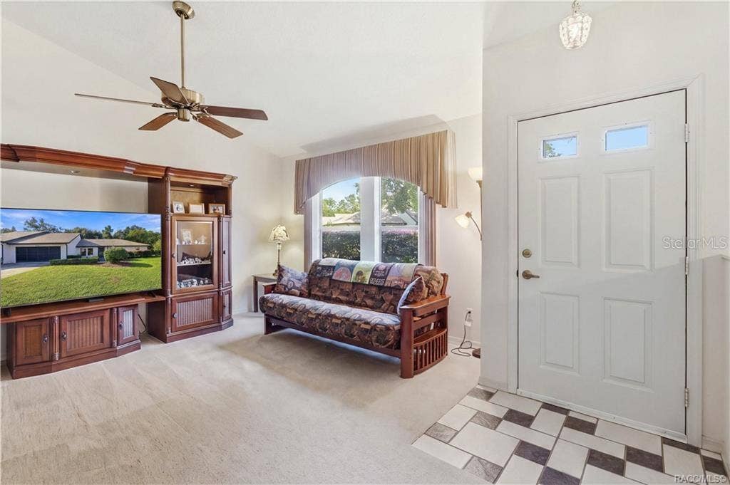 6268 W WESTON DRIVE, Crystal River, FL 34429 MAKE YOURSELF AT HOME! Bright & inviting LIVING ROOM w/VAULTED CEILINGS, CEILING FAN & large front window welcoming natural light!