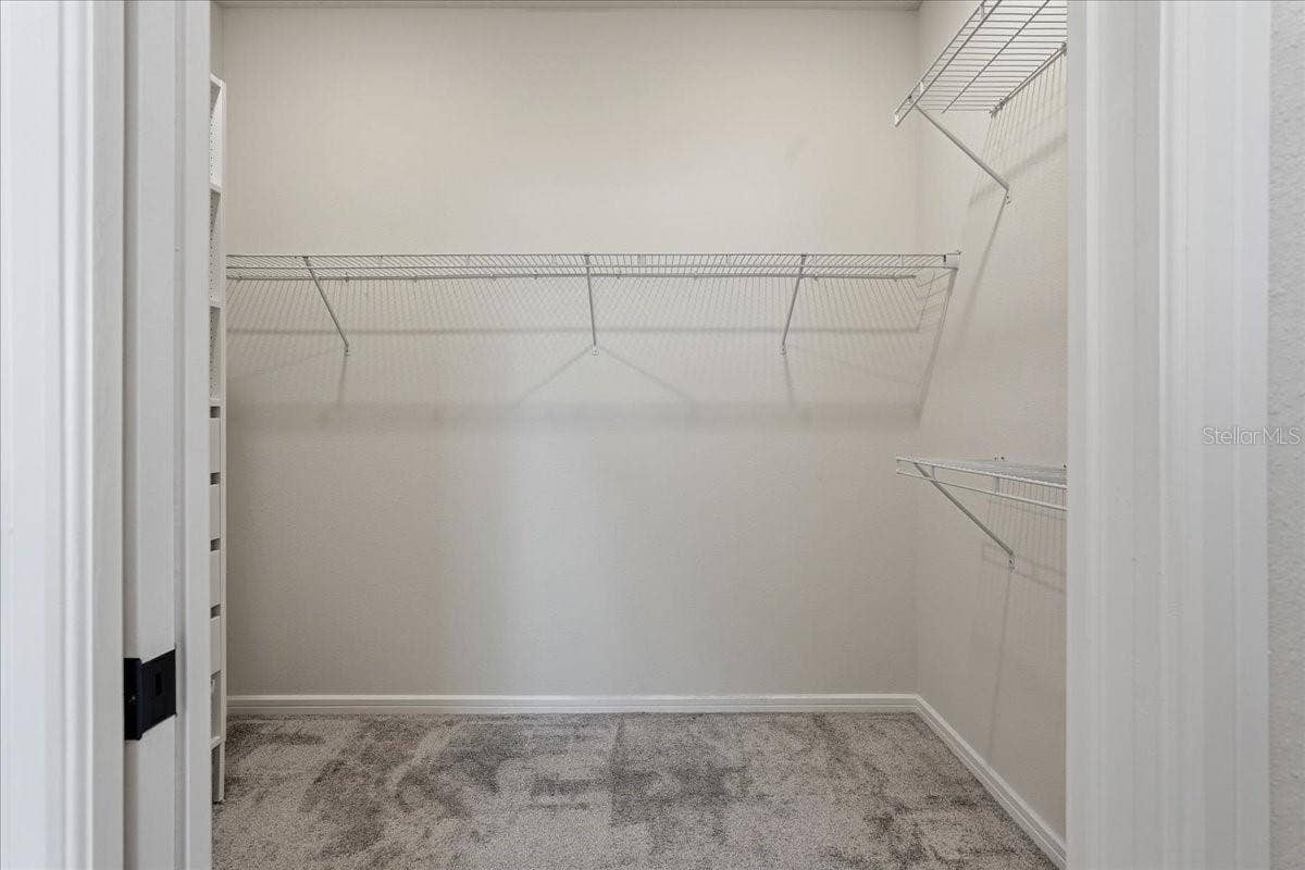 Primary Bedroom Walk In Closet