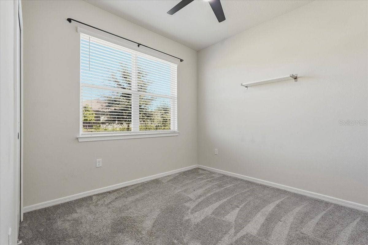 Bedroom 2 with View to Side Yard